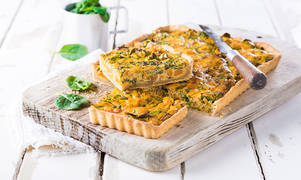 Pumpkin and curd cheese pie with spinach and walnuts